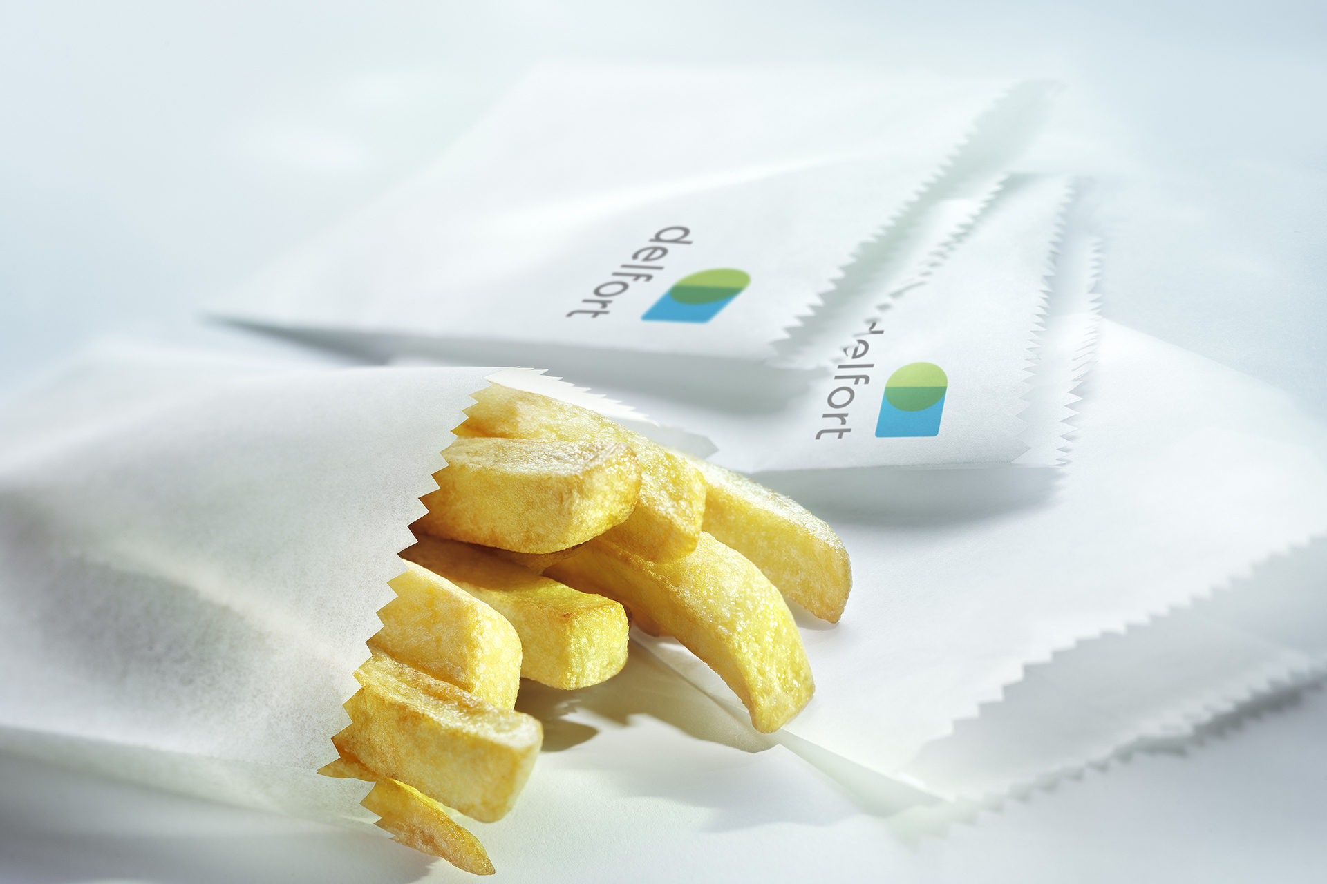 Fries in a small delfort paper bag