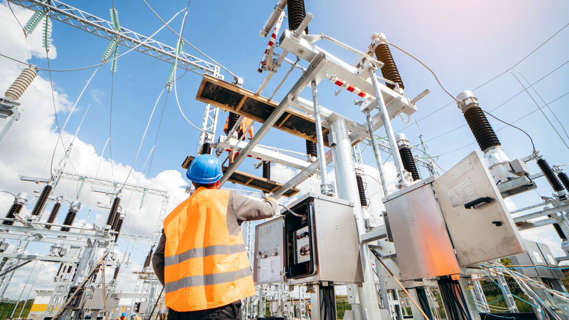 Adult electrical engineer inspect the electrical systems at the