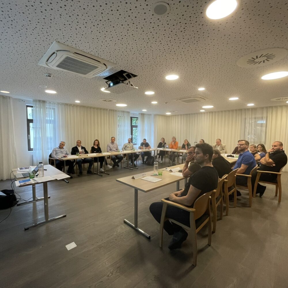 a group of people sitting on tables