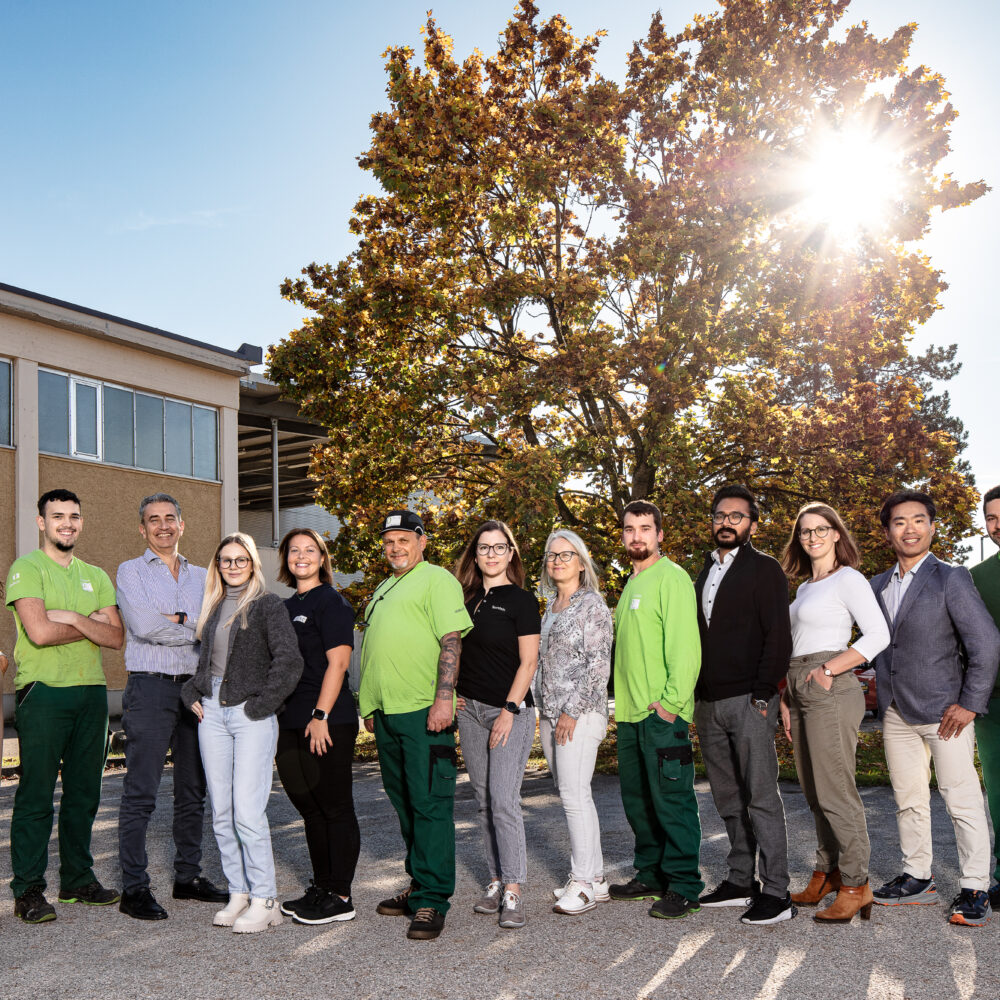 a group of people looking into the camera